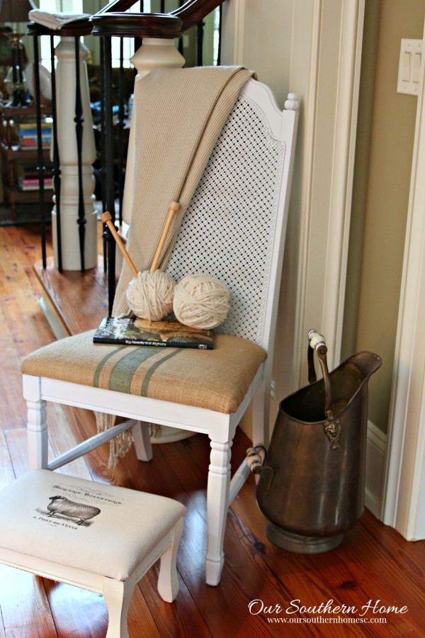 Thrift store chair makeover with spray paint and painted fabric chair cushion.