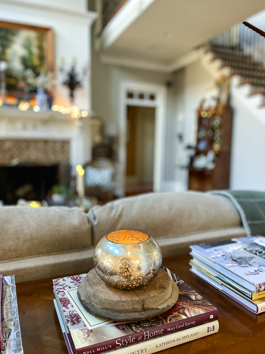 mercury glass candle holder and books