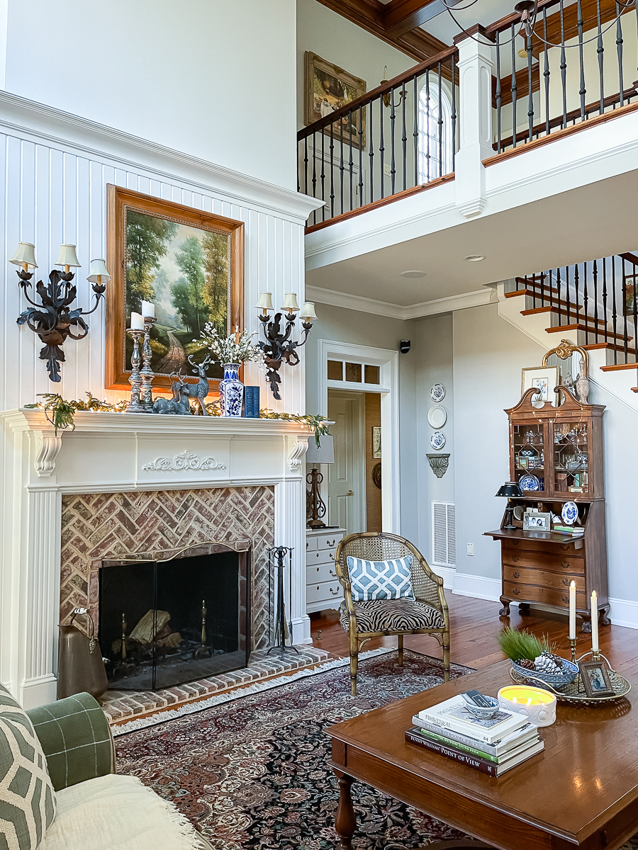 winter mantel with greenery and deer