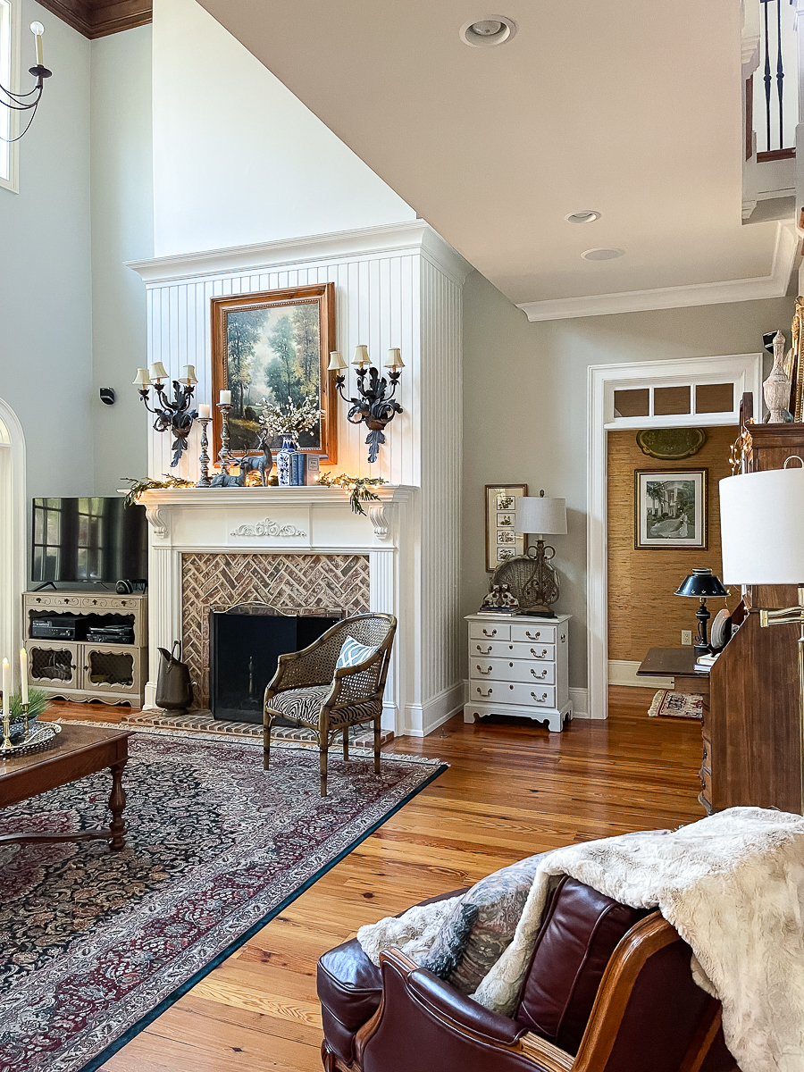 winter mantel with greenery and lights