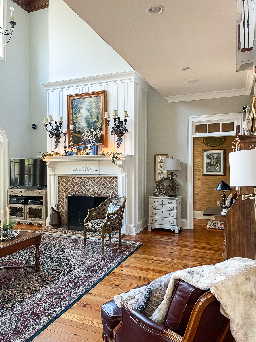 winter mantel with greenery and lights