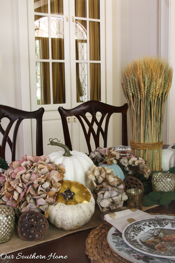 Creating a woodland tablescape for fall by Our Southern Home #falltable #falldecor #falltablescape