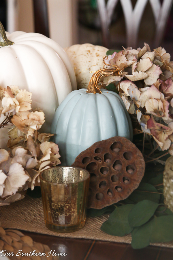 Creating a woodland tablescape for fall by Our Southern Home #falltable #falldecor #falltablescape